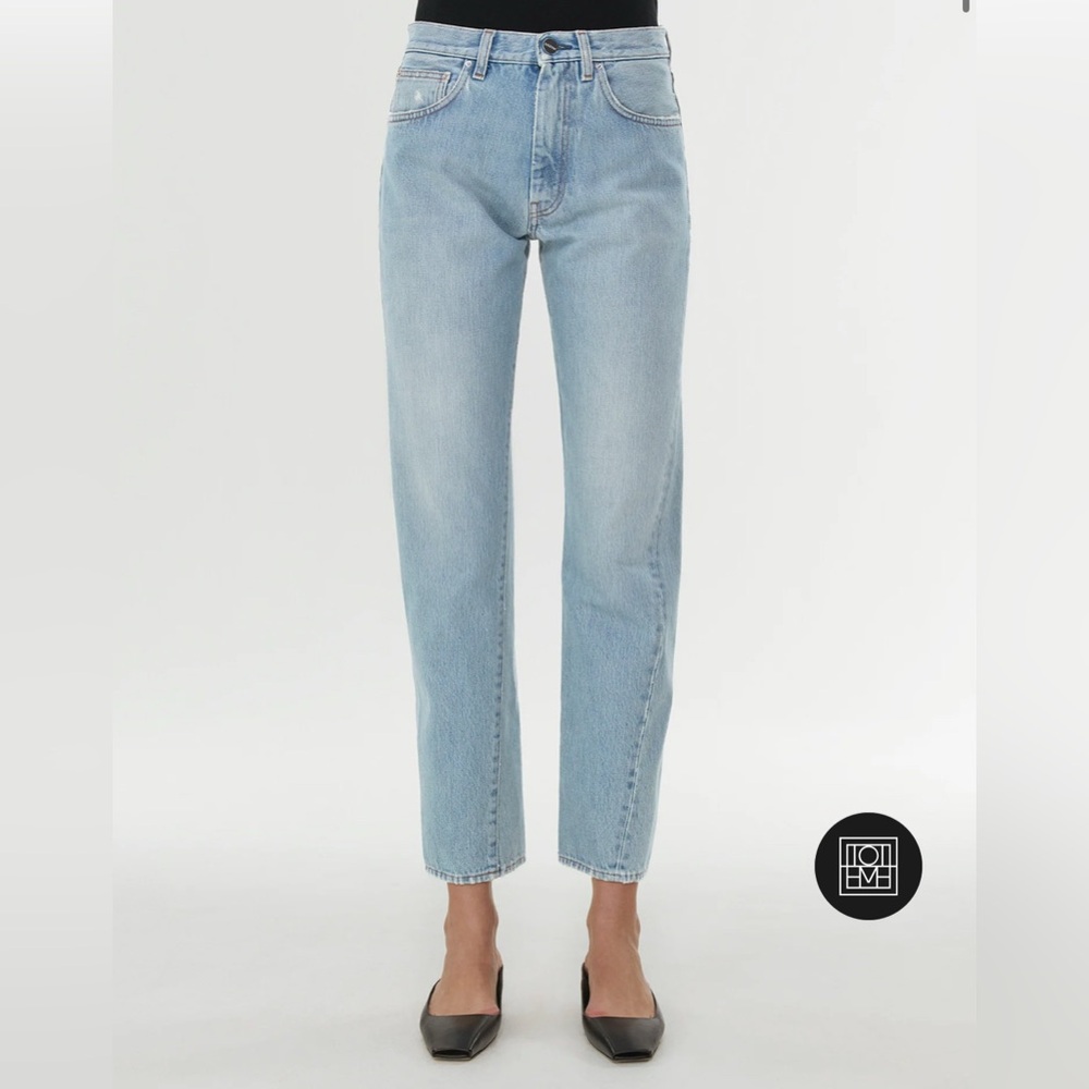 Toteme Twisted Seam Jeans. Size 27. Light blue.